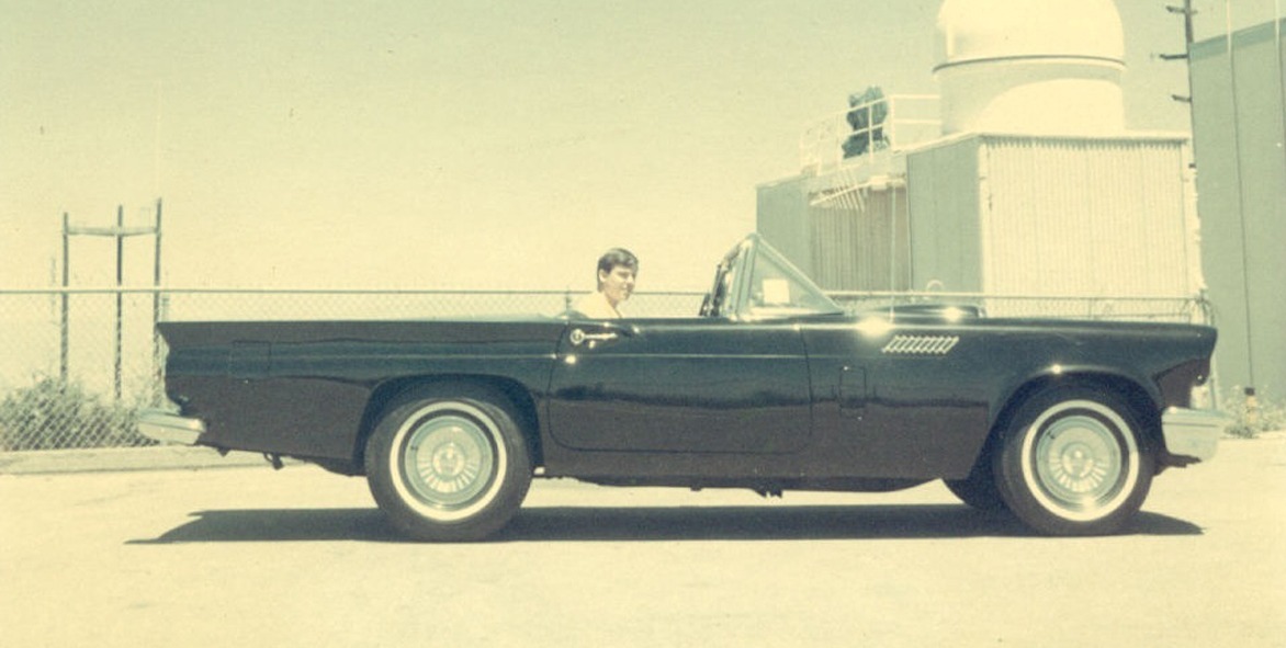 Daniel Smith sitting in his 1957 Ford Thunderbird