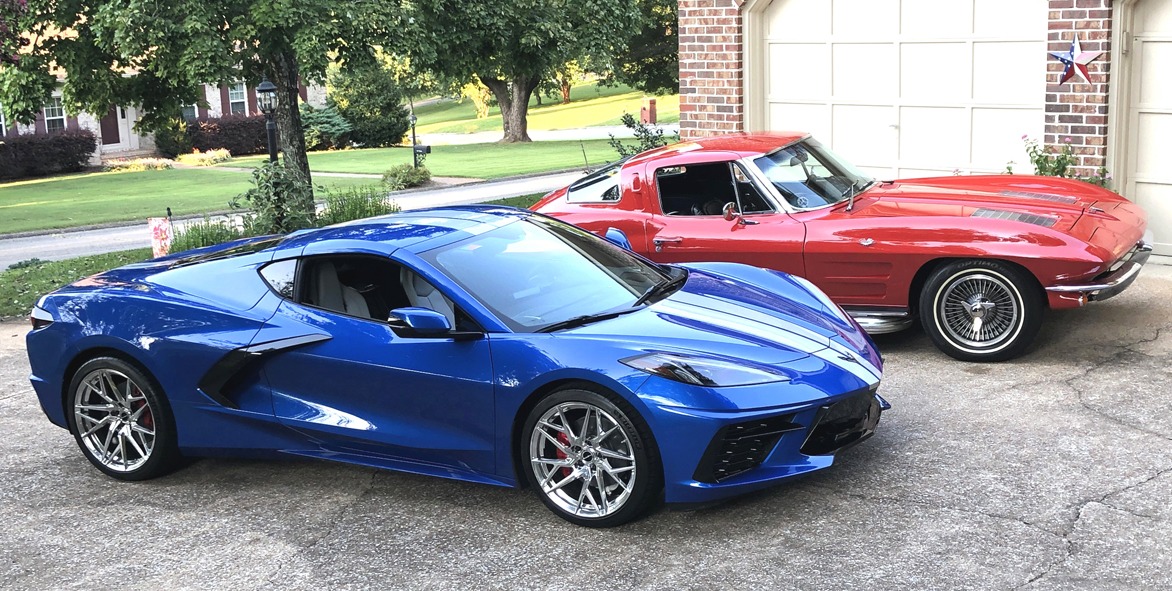 2018 and 1963 Corvettes parked in a driveway